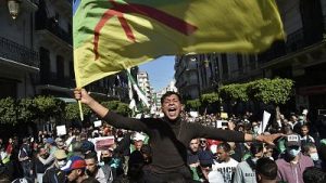 Thousands protest in Algiers to denounce legislative election plans