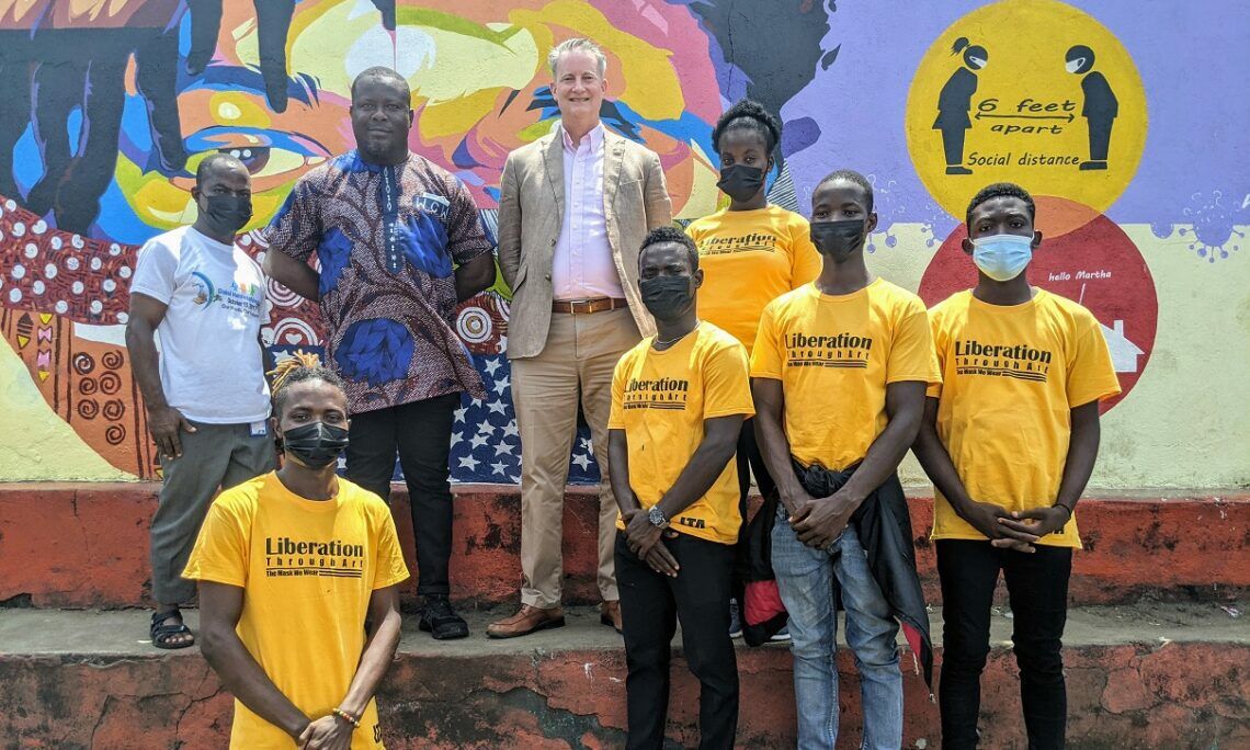 Ambassador Michael McCarthy and Sandra McCarthy visited the West Point township to view a new mural by Monrovian artist Patrick Gono and his team. The mural shows our shared fight against the COVID-19 pandemic and how to prevent a resurgence of it in Liberia.