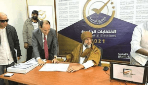 Photo source: Saif al-Islam Gaddafi, son of Libya’s former leader Muammar Gaddafi, registers as a presidential candidate for the election, in the southern town of Sebha.